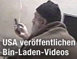 Osama bin Laden vor einem Fernsehgerät