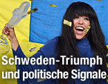 Gewinnerin des Song Contest 2012, Loreen mit Schweden-Flagge