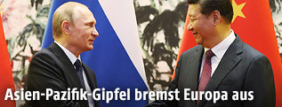 Russlands Präsident Wladimir Putin mit Chinas Präsident Xi Jinping